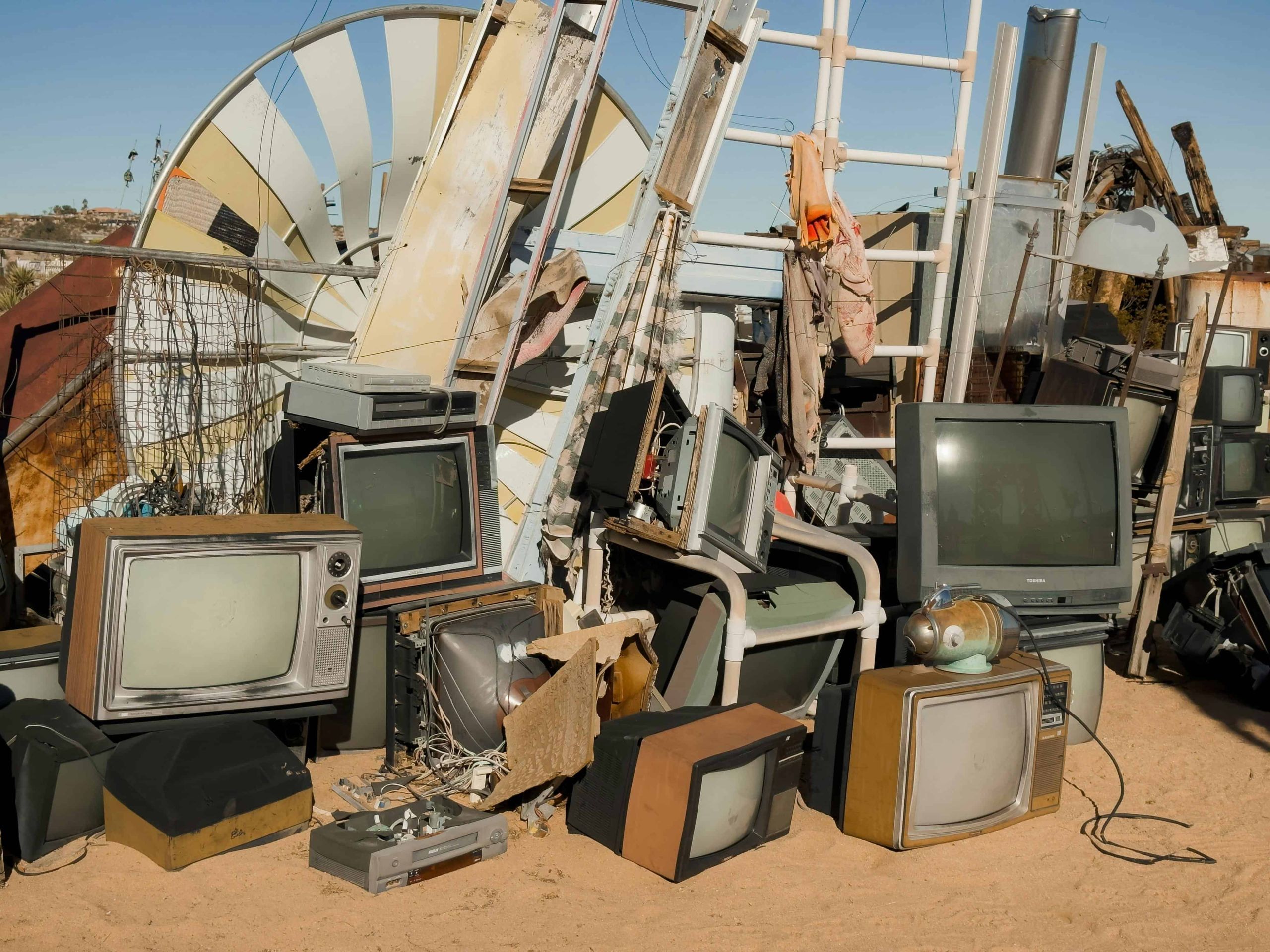 Image of piles of E-waste ready to be picked up and recycled