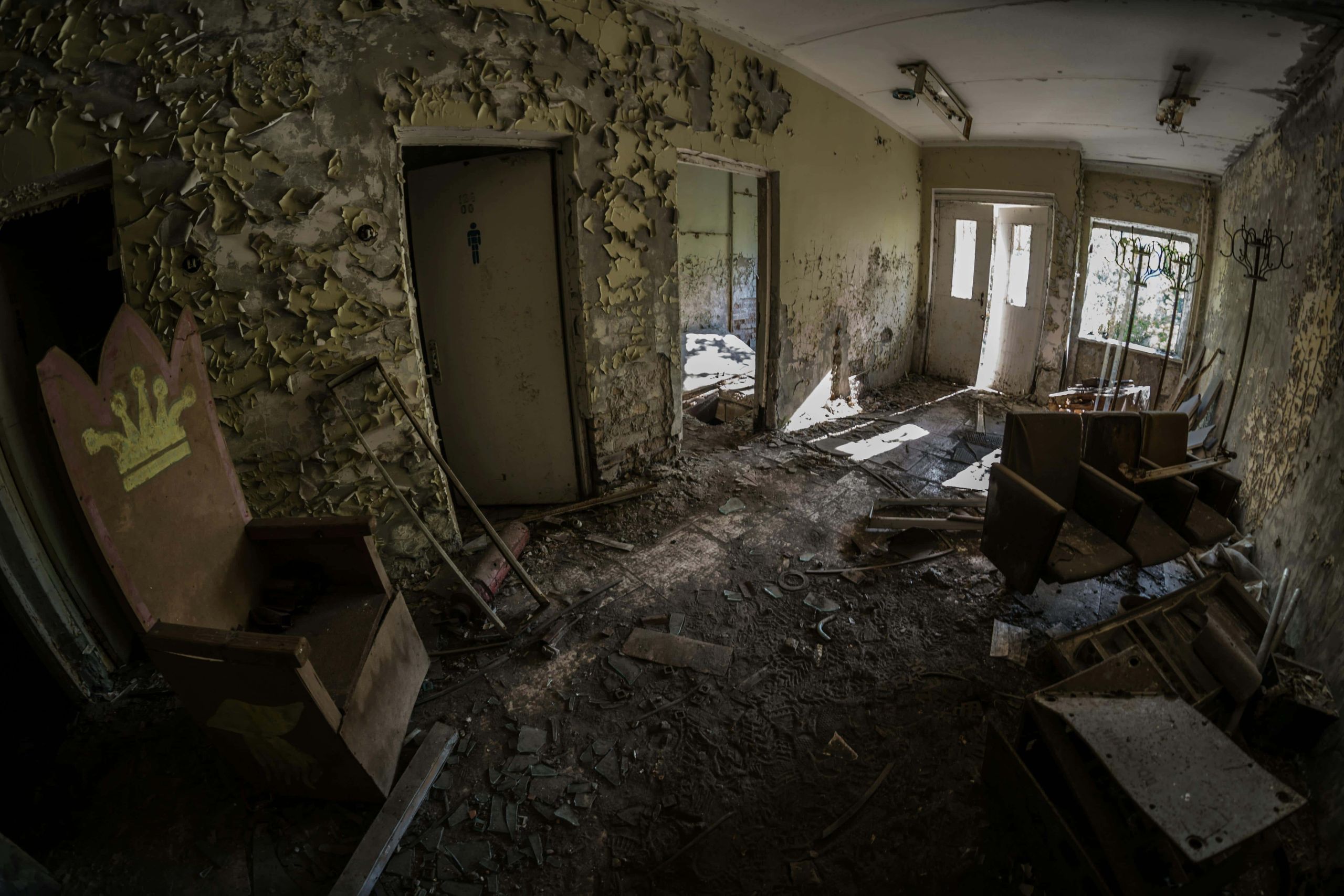 An image of broken old furniture that needs to be cleaned out of a house.